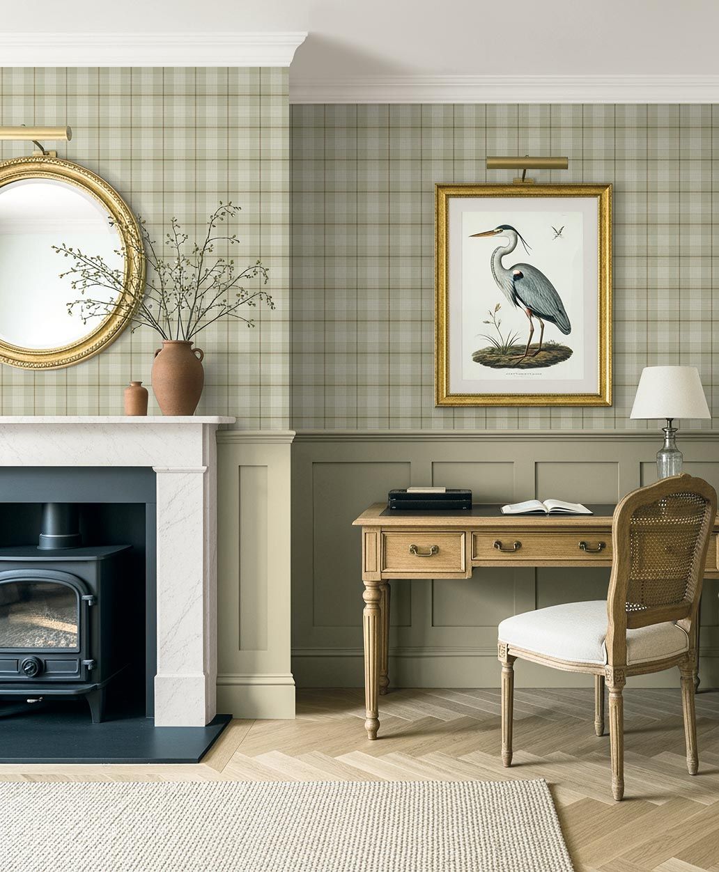 Torridon Fawn wallpaper by Carl Robinson, a soft fawn and olive tartan in a study with a fireplace and a heron print