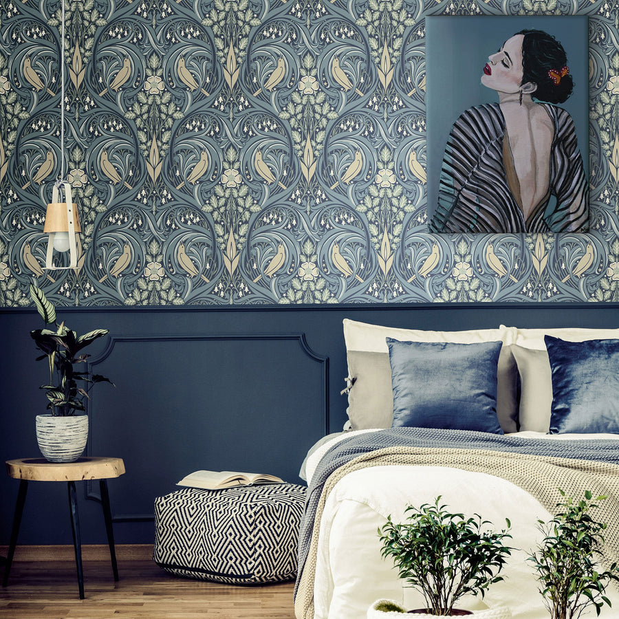Bird Scroll wallpaper by Galerie, birds perched among a scrolling Art Nouveau damask in blue above deep blue panelling
