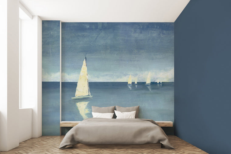 Ponto Azul mural by Tres Tintas, a painterly turquoise seascape crossed by sailboats behind a low bed on a herringbone floor