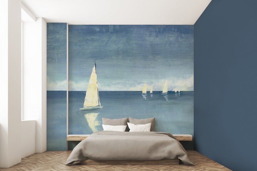 Ponto Azul mural by Tres Tintas, a painterly turquoise seascape crossed by sailboats behind a low bed on a herringbone floor