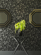 19911 Skulls Black Flock Wallpaper by Graham and Brown