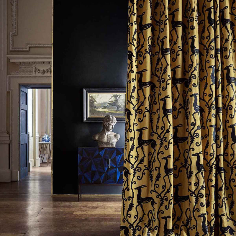 333017 Deco Deer Icons Tiger's Eye/Vine Black Fabric by Zoffany