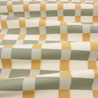 Lowen Moonstone Fabric by Romo draped