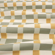 Lowen Moonstone Fabric by Romo draped
