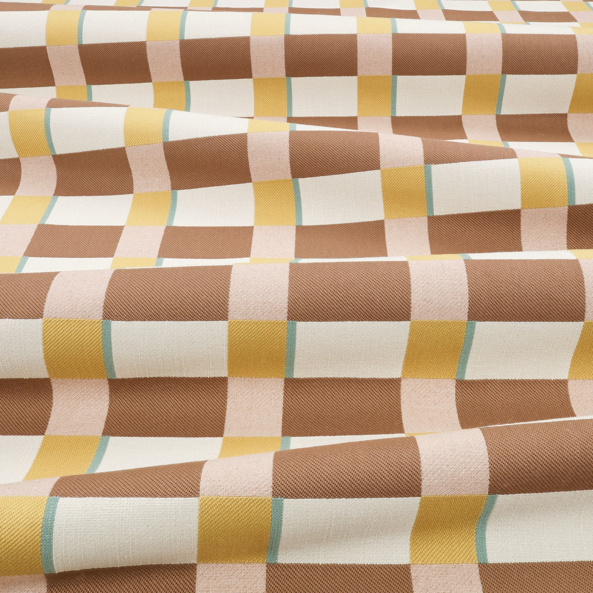 Lowen Cinnamon Fabric by Romo draped
