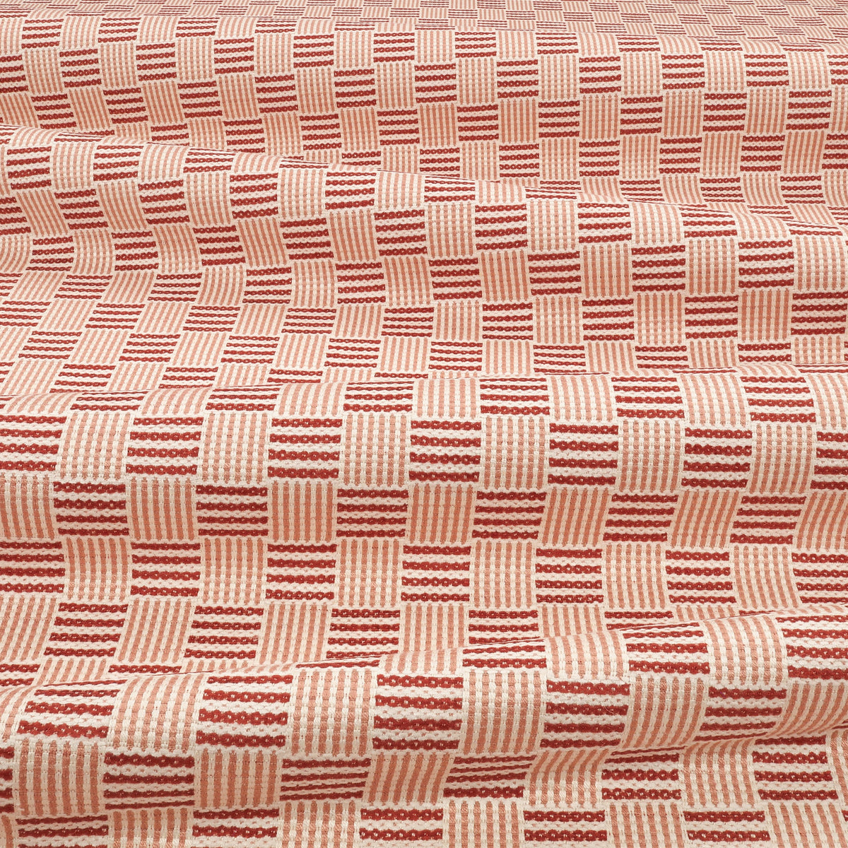 Coby Rouge Lowen Fabric by Romo draped
