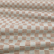 Coby Chocolate Lowen Fabric by Romo draped