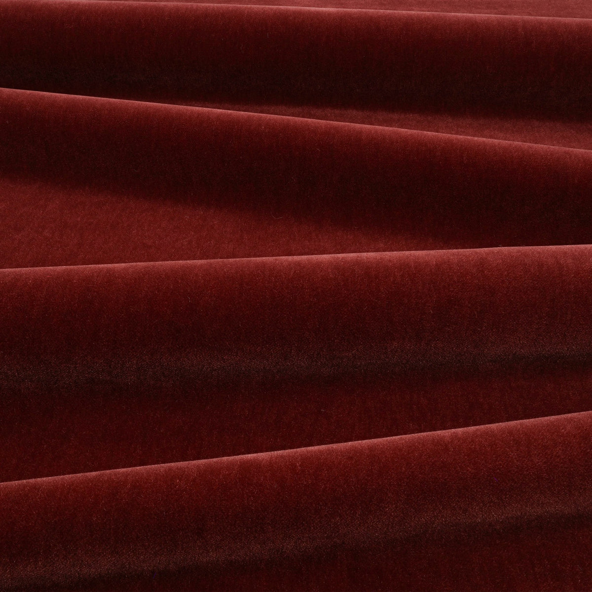 Fuzzy FR Crib 5 Rouge Fabric by Kirkby Design — draped