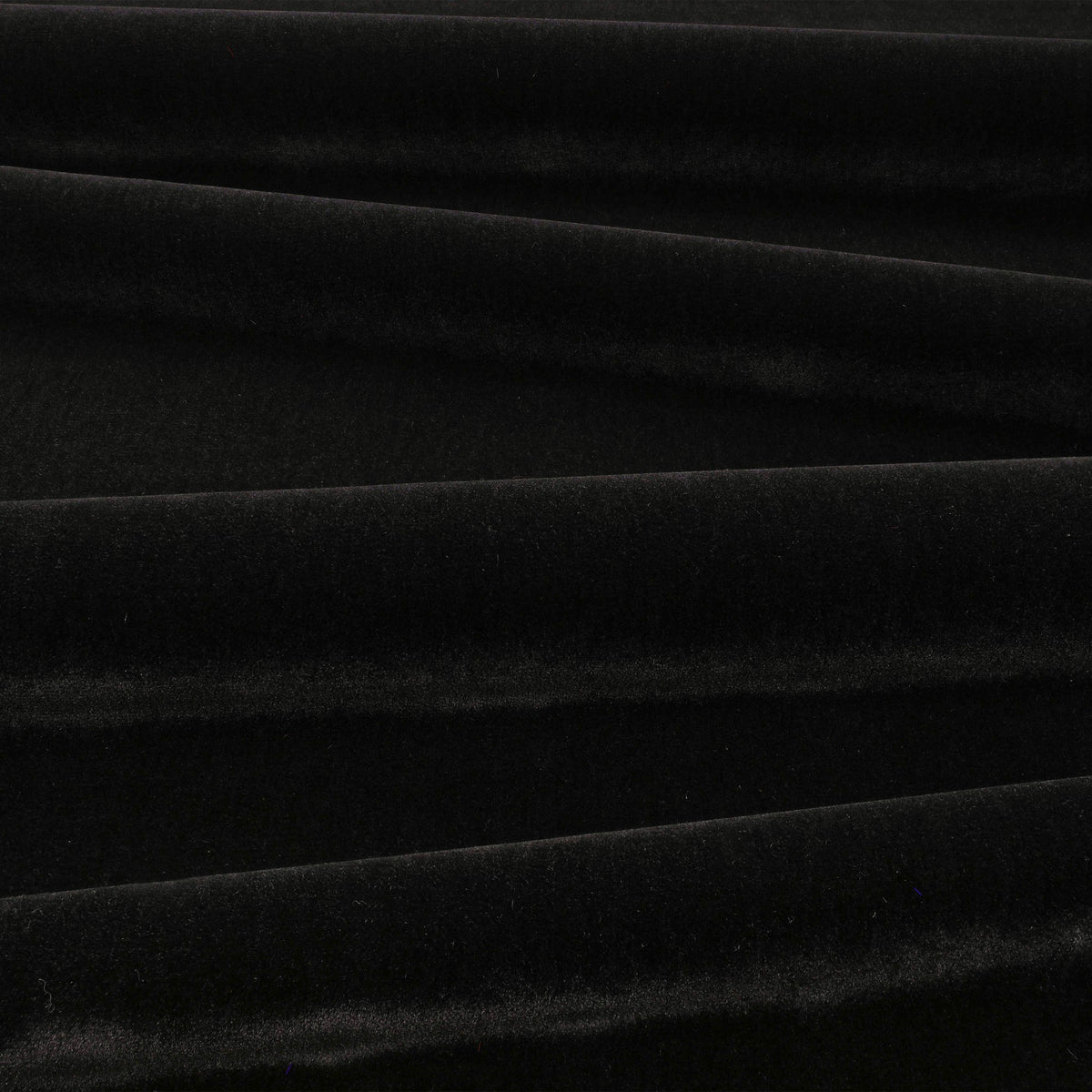 Fuzzy FR Crib 5 Jet Black Fabric by Kirkby Design — draped
