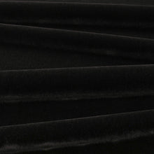 Fuzzy FR Crib 5 Jet Black Fabric by Kirkby Design — draped