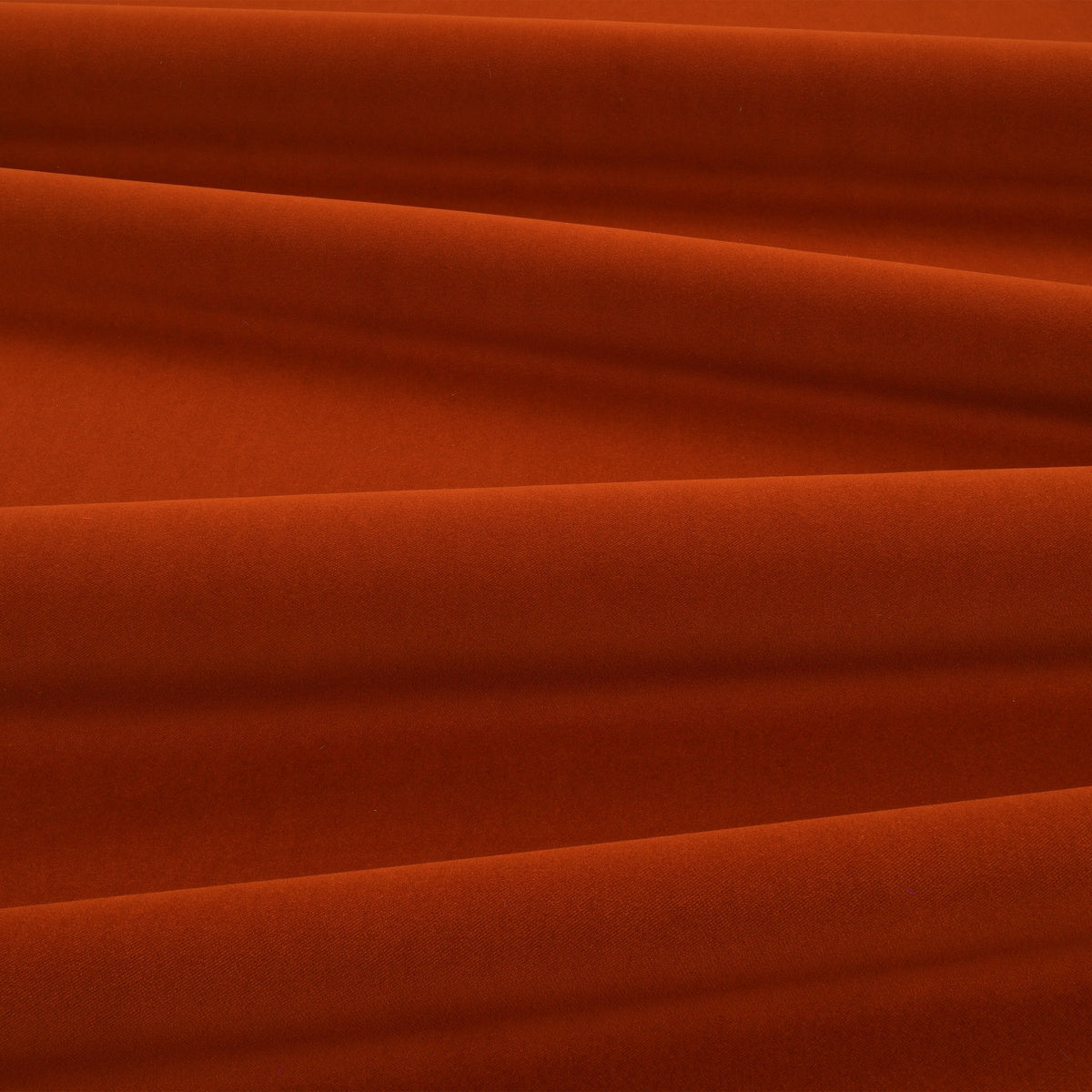Smooth IV Red Oxide Fabric by Kirkby Design — draped