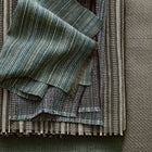 Latitude Peacock Rhythm Fabric by Mark Alexander