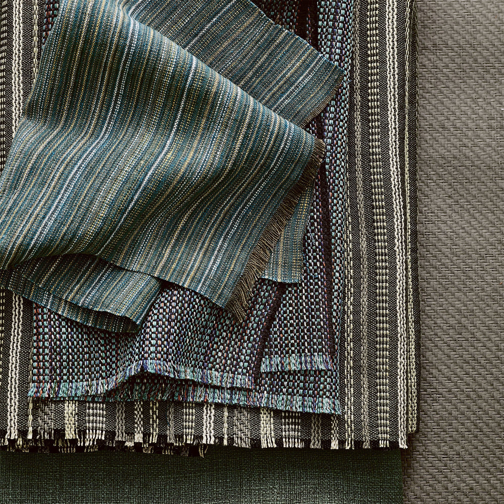 Latitude Peacock Rhythm Fabric by Mark Alexander