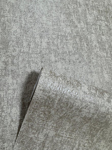 Mottled Specks Beige New Touch Wallpaper by Galerie — roll shot