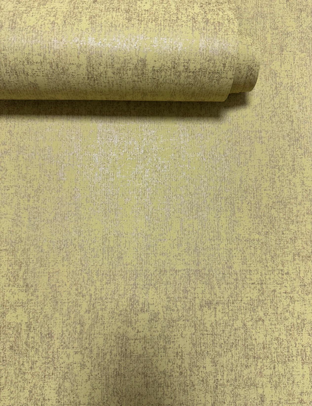 Mottled Specks Yellow New Touch Wallpaper by Galerie — roll shot