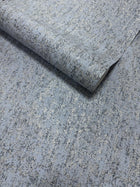 Mottled Specks Blue / Beige New Touch Wallpaper by Galerie — roll shot