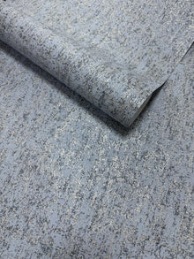 Mottled Specks Blue / Beige New Touch Wallpaper by Galerie — roll shot