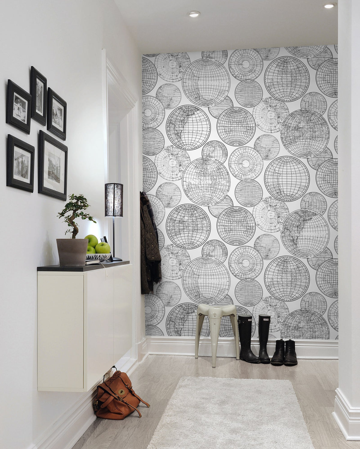 R13882 Globes Gathering Black and White Maps Mural by Rebel Walls