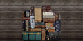 Stacked Suitcases Heap Passion Mural by Rebel Walls