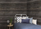 R14064 Stacked Suitcases Boards Passion Mural by Rebel Walls