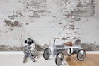 R14321 Industrial Ivory Curious Mural by Rebel Walls