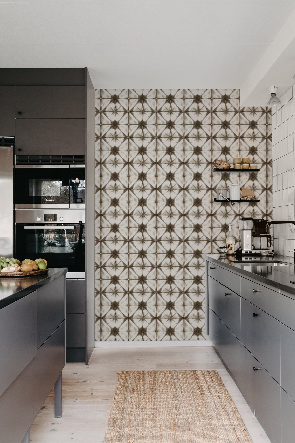 R18541 Tie Dye Kaleidoscope Brown Pops Wallpaper by Rebel Walls