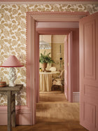 Taia Pigment Ochre Averly Wallcoverings Wallpaper by Romo in a room