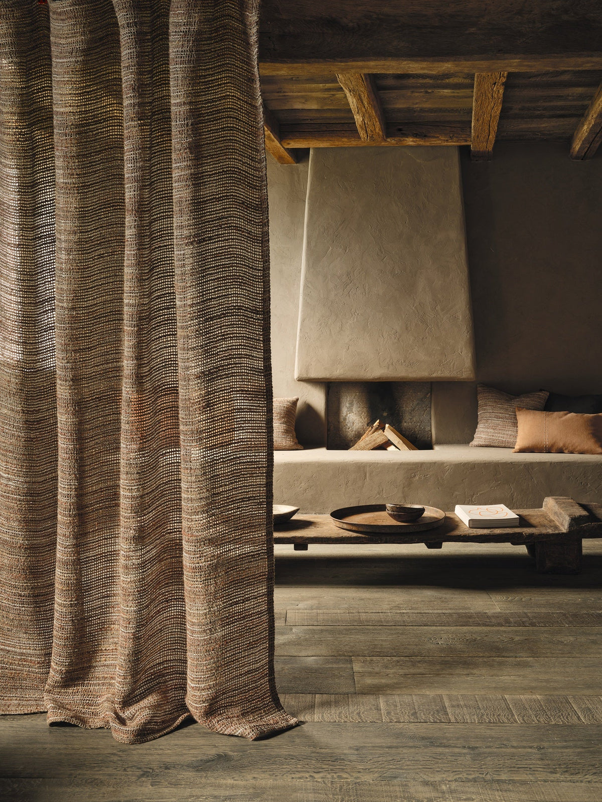 Canapa Cloth Terracotta Fabric by Mark Alexander in a room