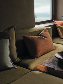 Canapa Cloth Terracotta Fabric by Mark Alexander in a room