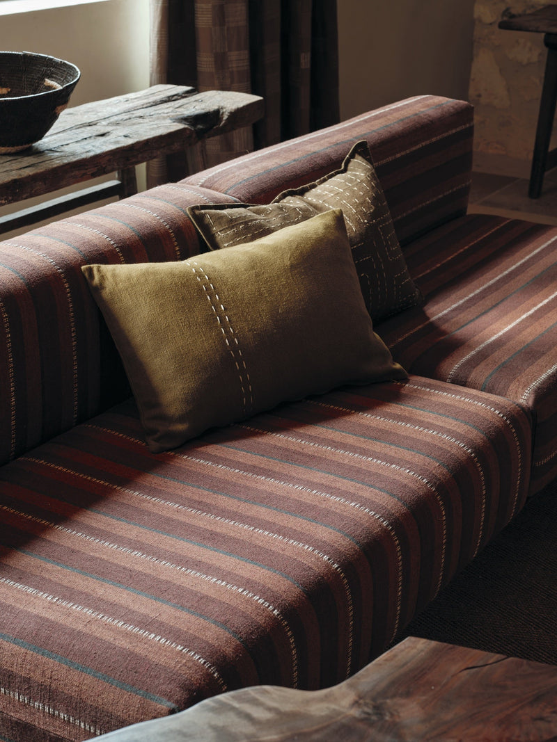 Boro Cumin Homespun Embroideries Fabric by Mark Alexander in a room