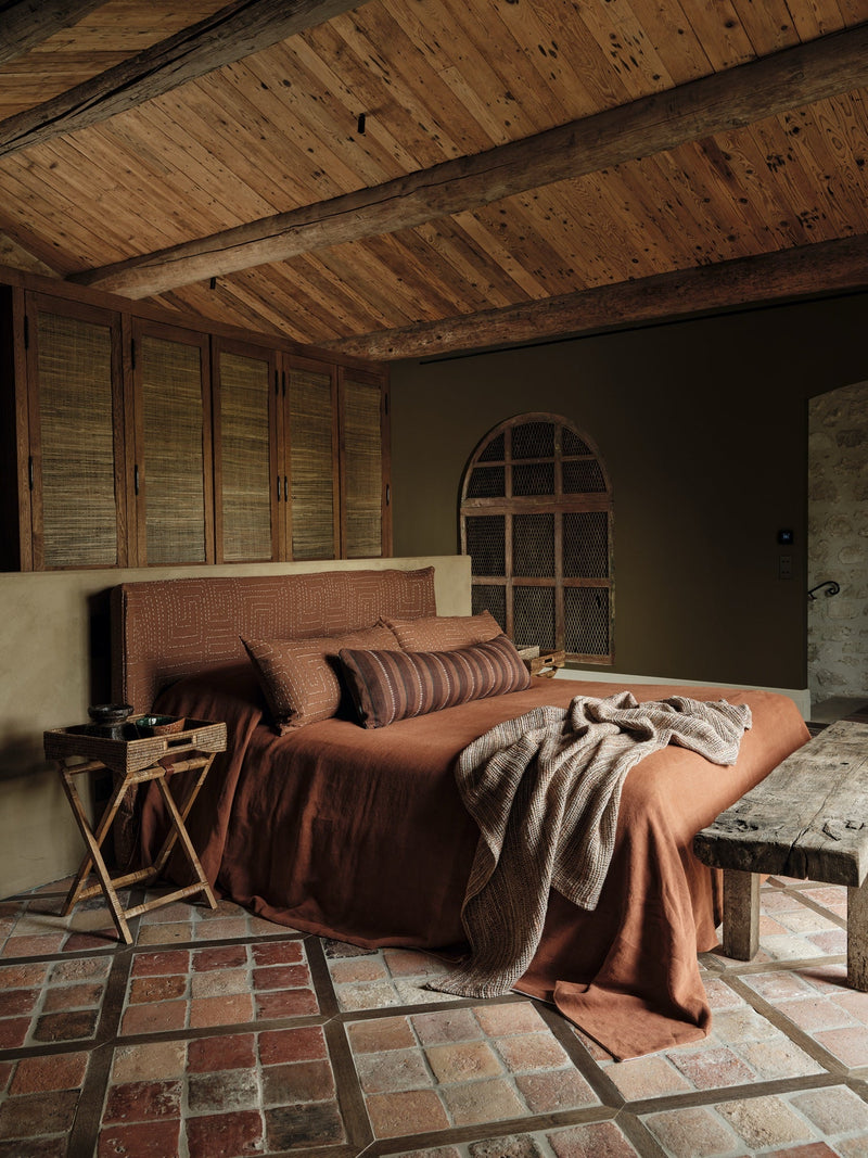 Kuba Embroidery Clay Homespun Embroideries Fabric by Mark Alexander in a room