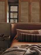 Kuba Embroidery Clay Homespun Embroideries Fabric by Mark Alexander in a room