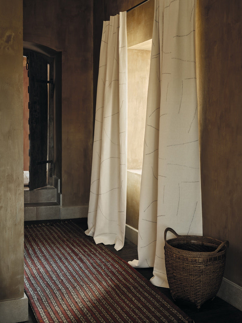 Gesture Jasper White Homespun Embroideries Fabric by Mark Alexander in a room