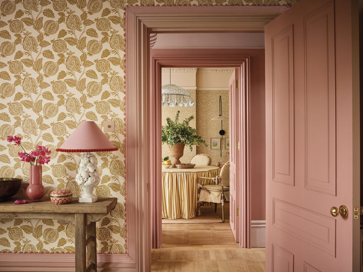 Taia Pigment Ochre Averly Wallcoverings Wallpaper by Romo in a room
