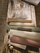 Nysa Linen Spice Textured Wallcoverings Vol.II Wallpaper by Romo in a room