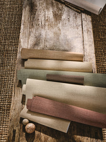 Nysa Linen Spice Textured Wallcoverings Vol.II Wallpaper by Romo in a room