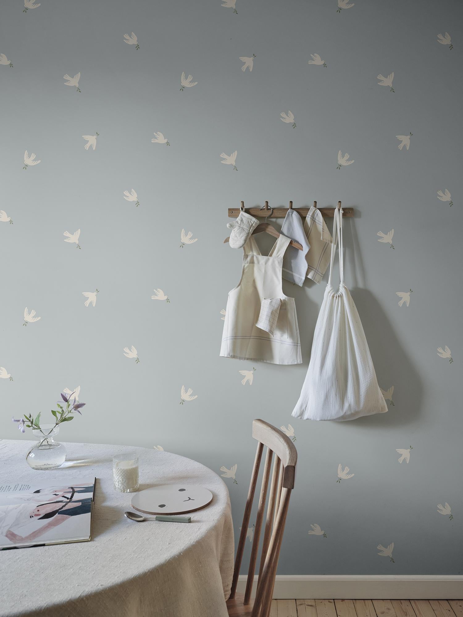 S10624 Light Blue Frida Familjen Wallpaper by Sandberg