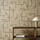 Dolmens Defined Momentum Sandstone/Gold Wallpaper by Harlequin