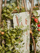 NPOP113384 On The VIne Tangerine/Kelly Green Wallpaper by Scion