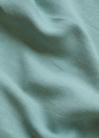 TSARTUR Sarga Turquesa Fabric by Coordonné - draped