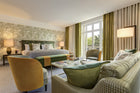Fleurs Etoilees wallpaper by Christopher Farr Cloth in a room setting